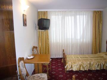 Фото номера Двухместный номер с 1 кроватью Отель Hotel Casa Pelerinul г. Дурэу 3